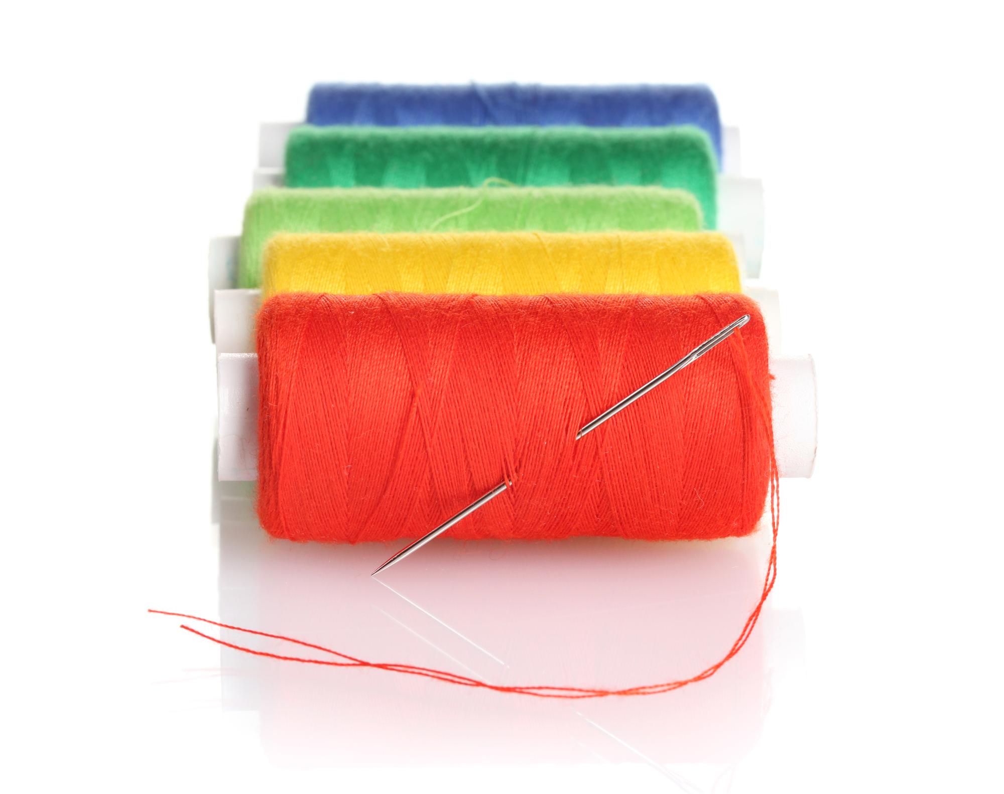 Close-up of colorful thread palette and stitches